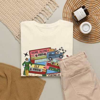 Retro Holiday Movie Stack T-Shirt — Elf, Grinch & Classic Christmas Cars Graphic Tee